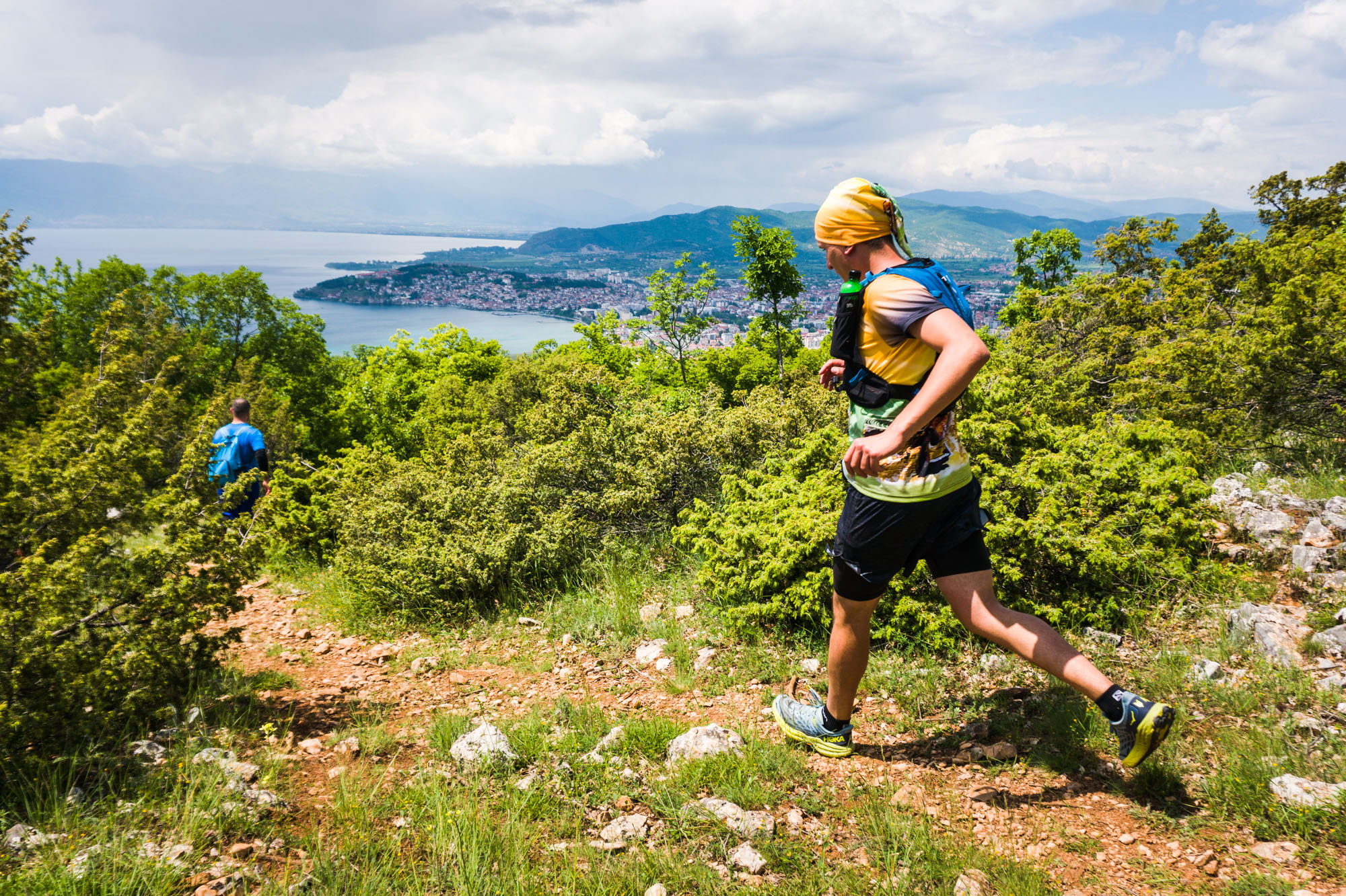 Letnica Trail descend with Trail runners running in the Galicica National Park towards Ohrid town